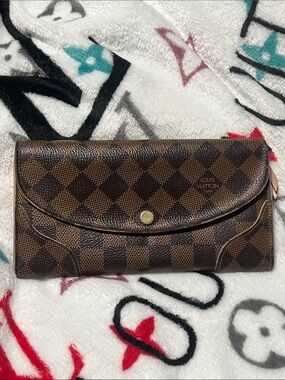 Louis Vuitton Damier Ebene Fold-Over Wallet in Brown